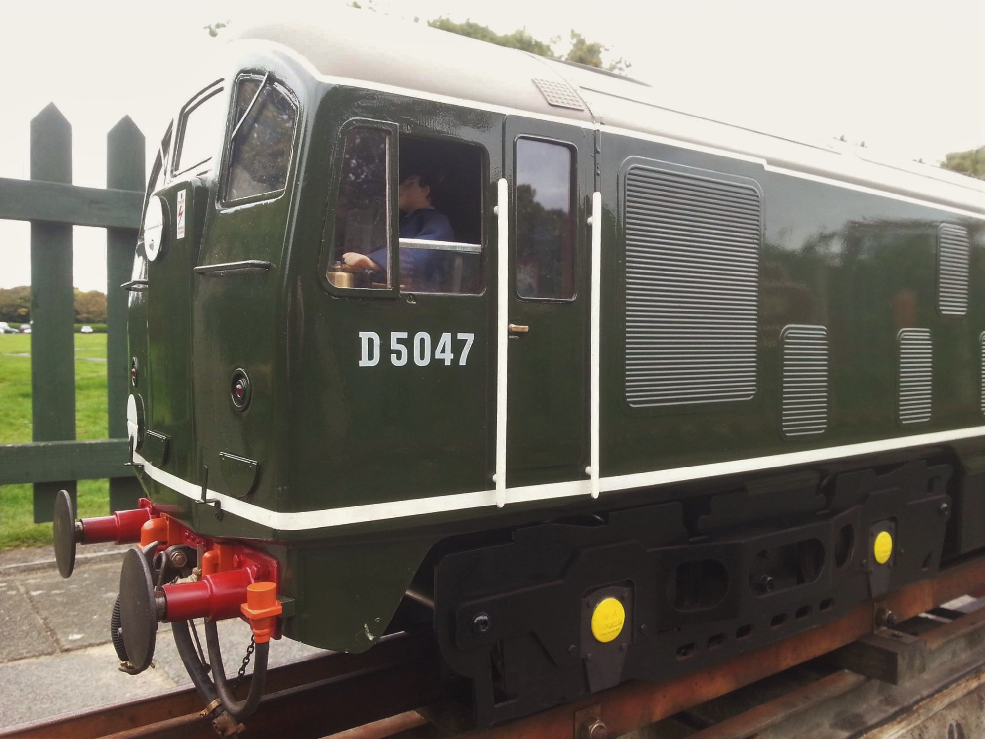 Green Class 24 D5047, with cab figure and bogie details. Photograph from the Phoenix company archive; photographer not confirmed.
